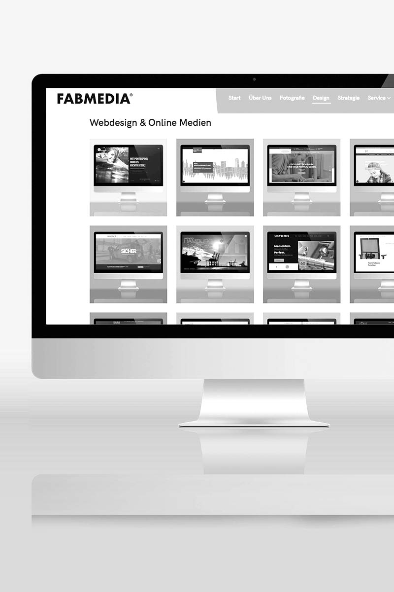 Bildschirm eines Computers mit der FABMEDIA Homepage.